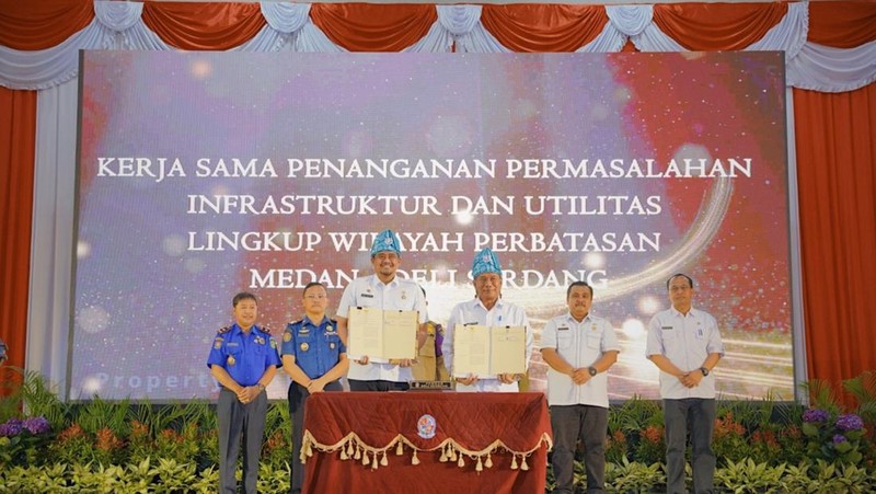 Pemerintah Kota (Pemkot) Medan dan Pemerintah Kabupaten (Pemkab) Deli Serdang melakukan Penguatan Hubungan Kerja Sama di Gedung Pertemuan