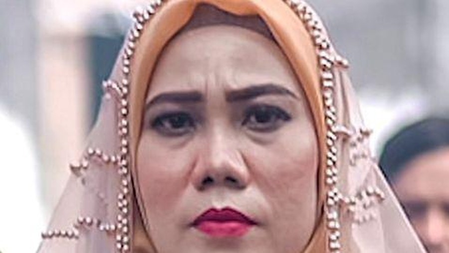 Pernikahan Risma dan Rozy.