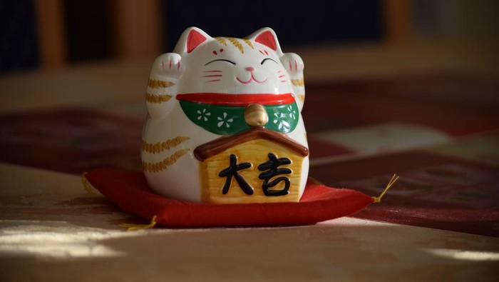 Makna patung kucing Maneki-Neko
