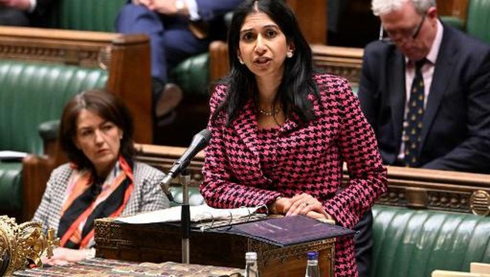 A handout photograph released by the UK Parliament shows Britain's Home Secretary Suella Braverman giving a statement on former British police officer David Carrick, who was sacked after admitting being a serial rapist, in the House of Commons, in London, on January 17, 2023. - British police officer David Carrick who admitted being a serial rapist was formally sacked on January 17, 2022, as the government called on forces across the country to root out the criminal and corrupt in their ranks. Carrick's guilty plea to 24 counts of rape against 12 women and a string of other sex offences over two decades has caused widespread shock, undermining public faith in the police. (Photo by JESSICA TAYLOR / UK PARLIAMENT / AFP) / RESTRICTED TO EDITORIAL USE - NO USE FOR ENTERTAINMENT, SATIRICAL, ADVERTISING PURPOSES - MANDATORY CREDIT 