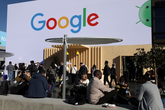 LAS VEGAS, NEVADA - JANUARY 06:  Attendees visit the Google booth at CES 2023 at the Las Vegas Convention Center on January 06, 2023 in Las Vegas, Nevada. CES, the world's largest annual consumer technology trade show, runs through January 08 and features about 3,200 exhibitors showing off their latest products and services to more than 100,000 attendees. (Photo by Alex Wong/Getty Images)
