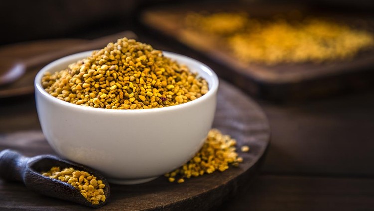 Bee pollen healthy bee pollen grains on wooden background