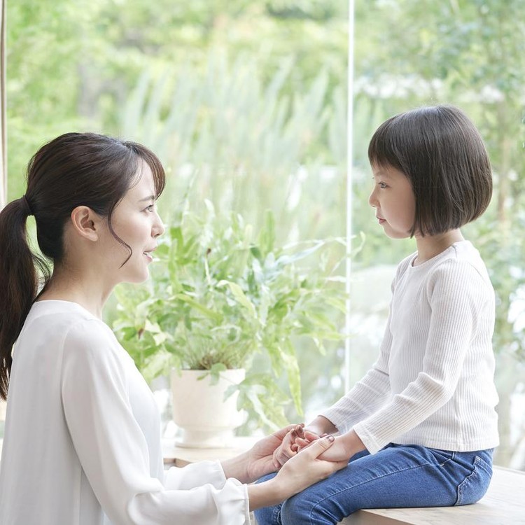 Asian mother talking with the daughter