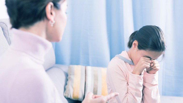 Mother scolding his teenage daughter for wrong things and bad behavior