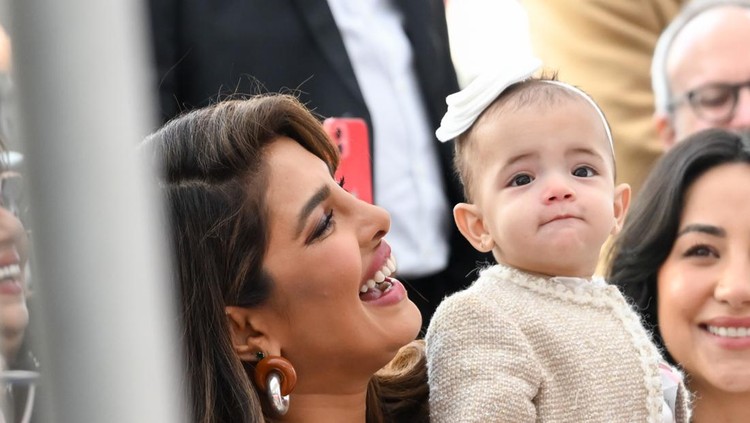Priyanka Chopra Jonas and Malti Marie Chopra Jonas at the star ceremony where the Jonas Brothers are honored with a star on the Hollywood Walk of Fame on January 30, 2023 in Los Angeles, California (Photo by Michael Buckner/Variety via Getty Images)