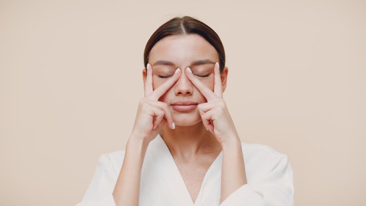 1300104948 Young woman doing face building facial gymnastics self massage