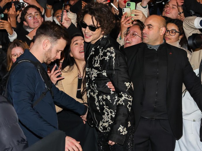 PARIS, FRANCE - JANUARY 25: Timothée Chalamet is seen arriving at the Jean-Paul Gaultier show during Paris Fashion Week Haute Couture Spring Summer 2023 on January 25, 2023 in Paris, France. (Photo by Arnold Jerocki/Getty Images)