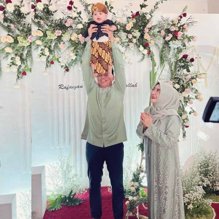 <p>Di momen spesial itu, Tri Goffarudin Pulungan tampak menggendong sang putra setinggi-tingginya. Ekspresi wajah Rafaizan bikin gemas, Bunda. Uut juga menuliskan harapannya sebagai orang tua. <em>"Mugi dedek rafa dados tiyang sing sabar atine,soleh pikolahe lan sareh tumindake.ugi dados putra sing saget berguna lan berbakti kagem agama,kedua ora tua lan berguna kagem nusa dan bangsa," t</em>ulisnya dalam bahasa Jawa. (Foto: Instagram @uutpermatasari)</p>