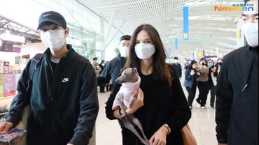 img-title Pergi ke Eropa, Song Joong Ki dan Katy Louise Sapa Fans di Bandara