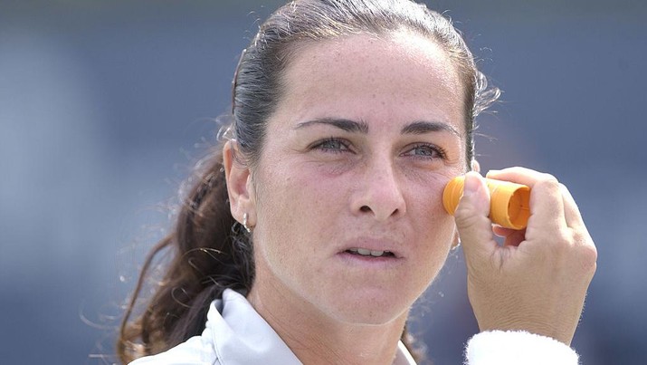 28 Aug 2001:  Silvia Farina Elia of Italy applies sun screen during her match with Maja Matevzic of Slovenia during the first round of the US Open at the USTA National Tennis Center,  Flushing,  New York. Matevzic won  6-2, 6-4. DIGITAL IMAGE Mandatory Credit: Ezra Shaw/ALLSPORT
