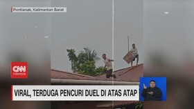 VIDEO: Terduga Pencuri Vs Warga Duel di Atas Atap