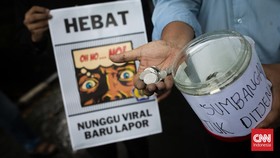 FOTO: Aksi Koin untuk Dirjen Pajak