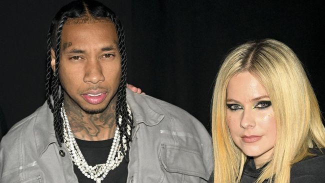 Sumber buka suara mengenai hubungan Avril Lavigne dan Tyga yang terlihat berciuman di pesta saat Paris Fashion Week, Senin (6/3).