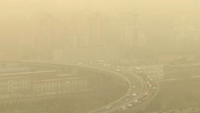 FOTO: Melihat Kota Beijing yang Diterjang Badai Pasir