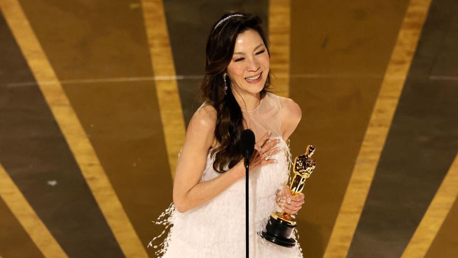 HOLLYWOOD, CALIFORNIA - MARCH 12: Michelle Yeoh accepts the Best Actress award for 