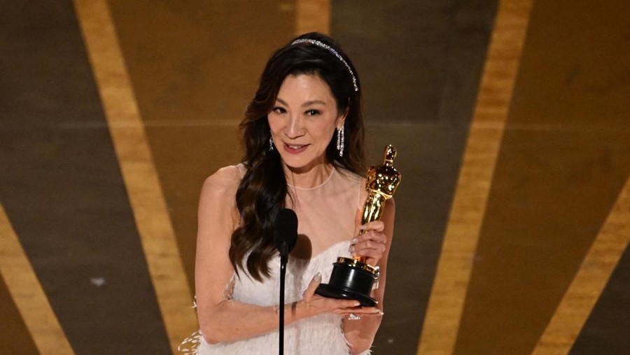 Malaysian actress Michelle Yeoh accepts the Oscar for Best Actress in a Leading Role for 