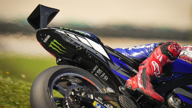 Viral Sayap Belakang Aneh Yamaha di Tes MotoGP Portimao Yamaha pamer sayap belakang berbentuk segitiga pada tes pramusim MotoGP 2023 di Sirkuit Portimao, Portugal, Minggu (12/3).