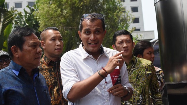 Pengacara Wamenkumham, Ricky Sihotang memastikan kliennya tak pernah meminta polisi menangkap Ketua IPW Sugeng Teguh Santoso.