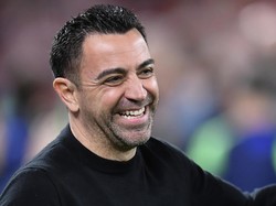 Peluk-Cium dari Laporta buat Xavi