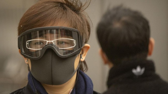 FOTO: Beijing yang Diselimuti Badai Pasir dan Partikel Bahaya