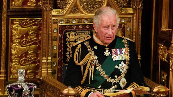 Britain's Prince Charles, Prince of Wales (R) sits by the The Imperial State Crown (L) in the House of Lords Chamber during the State Opening of Parliament at the Houses of Parliament, in London, on May 10, 2022. - Queen Elizabeth II will miss Tuesday's ceremonial opening of Britain's parliament, as Prime Minister Boris Johnson tries to reinvigorate his faltering government by unveiling its plans for the coming year. (Photo by Alastair Grant / POOL / AFP) (Photo by ALASTAIR GRANT/POOL/AFP via Getty Images)