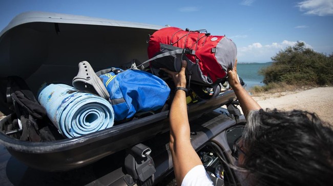 Pasang roof box di mobi ada aturan mainnya dan siasati pula efeknya pada gaya berkendara.