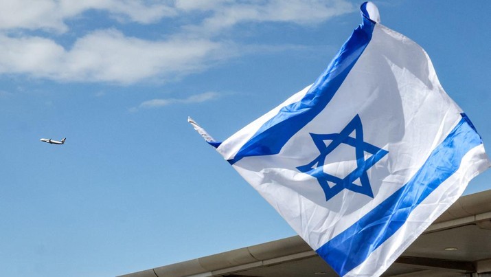 Ilustrasi bendera Israel (AFP via Getty Images/AHMAD GHARABLI)