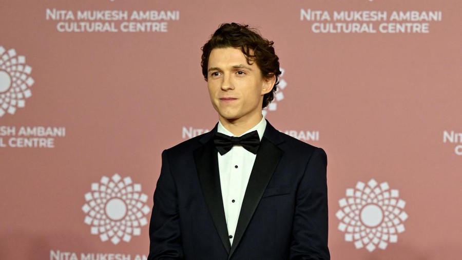 In this picture taken on April 1, 2023, Hollywood actor Tom Holland poses for pictures during the inauguration of the Nita Mukesh Ambani Cultural Centre (NMACC) at the Jio World Centre (JWC) in Mumbai. (Photo by SUJIT JAISWAL / AFP) (Photo by SUJIT JAISWAL/AFP via Getty Images)