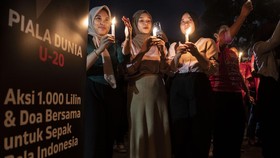 Aksi 1000 Lilin Digelar Usai Piala Dunia U-20 Batal di Indonesia
