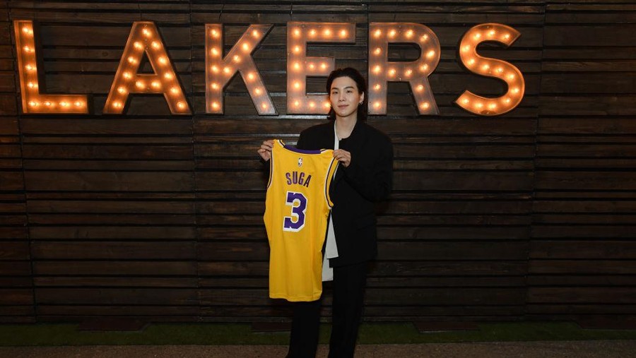 LOS ANGELES, CA - JANUARY 12: SUGA of BTS attends the game between the Dallas Mavericks and the Los Angeles Lakers on January 12, 2023 at Crypto.Com Arena in Los Angeles, California. NOTE TO USER: User expressly acknowledges and agrees that, by downloading and/or using this Photograph, user is consenting to the terms and conditions of the Getty Images License Agreement. Mandatory Copyright Notice: Copyright 2023 NBAE (Photo by Juan Ocampo/NBAE via Getty Images)