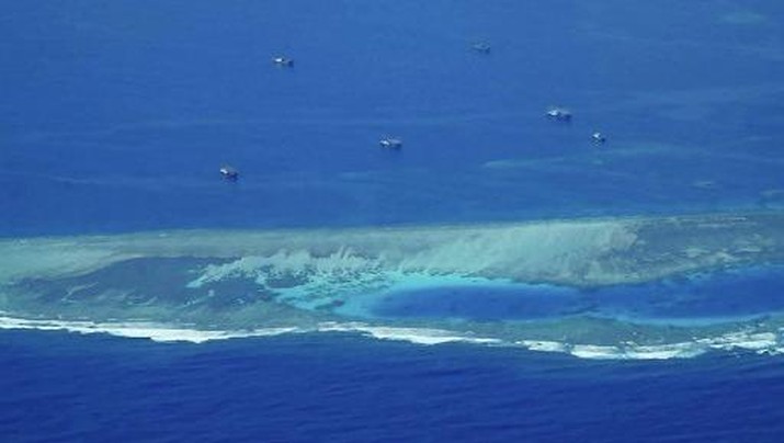 This handout photo taken on February 21, 2023 and received from the National Task Force for the West Philippine Sea (NTF-WPS) on February 22 shows suspected Chinese maritime militia vessels anchored off a disputed shoal in the Spratly Island group in the South China Sea. - China claims sovereignty over almost the entire South China Sea, through which trillions of dollars in trade passes annually, and has ignored an international court ruling that its claims have no legal basis. (Photo by Handout / National Task Force for the West Philippine Sea / AFP) / RESTRICTED TO EDITORIAL USE - MANDATORY CREDIT 