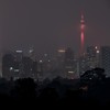 Malaysia's capital skyline with the Petronas Twin Towers (L) and Kuala Lumpur Tower (R) landmarks is blanketed by haze in Kuala Lumpur on September 18, 2019. - Toxic haze from Indonesian forest fires closed thousands of schools across the country and