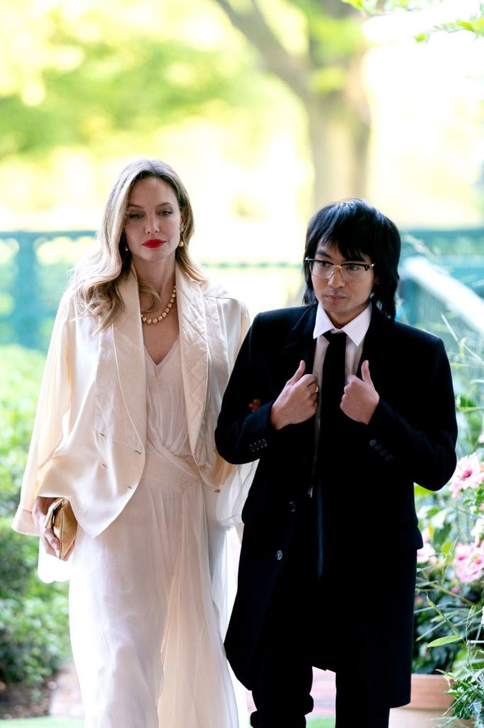 Actress Angelina Jolie, left, and Maddox Jolie-Pitt arrive to attend a state dinner in honor of South Korean President Yoon Suk Yeol and South Korean First Lady Kim Keon Hee hosted by US President Joe Biden and First Lady Jill Biden at the White House in Washington, DC, US, on Wednesday, April 26, 2023. The US will strengthen the deterrence it provides South Korea against nuclear threats, securing a pledge from Seoul to honor commitments to not pursue its own atomic arsenal. Photographer: Sarah Silbiger/Bloomberg via Getty Images