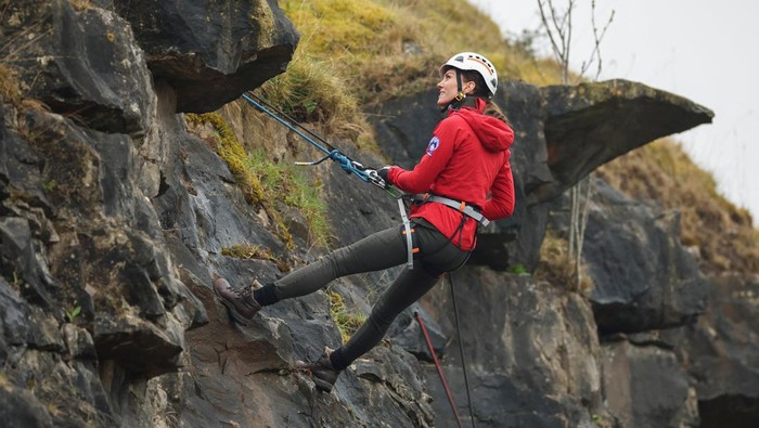 Catherine, Princess of Wales rappels down during a visit to the Central Beacons Mountain Rescue Team in Merthyr Tydfil, Britain April 27, 2023. REUTERS/Phil Noble