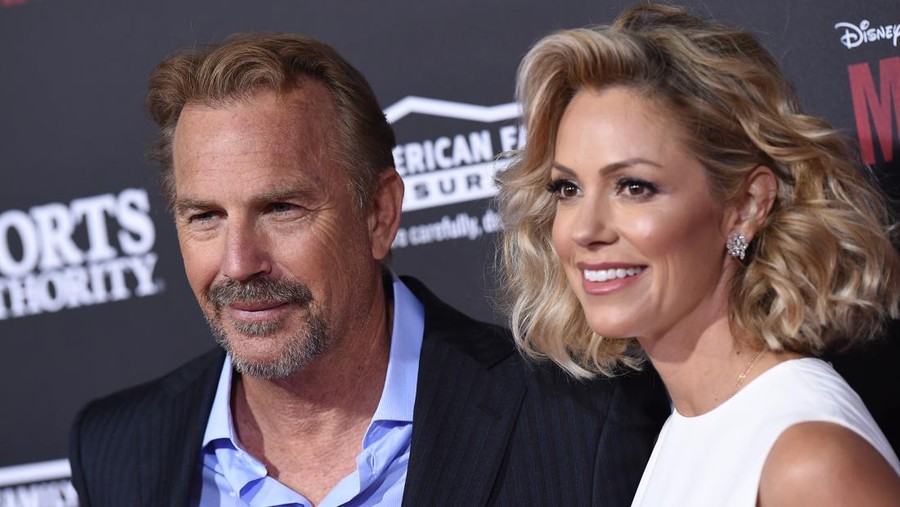 464352768 HOLLYWOOD, CA - FEBRUARY 09: Actor Kevin Costner and wife Christine Baumgartner arrive at the World Premiere of Disney's 'McFarland, USA' at the El Capitan Theatre on February 9, 2015 in Hollywood, California. (Photo by Axelle/Bauer-Griffin/FilmMagic)