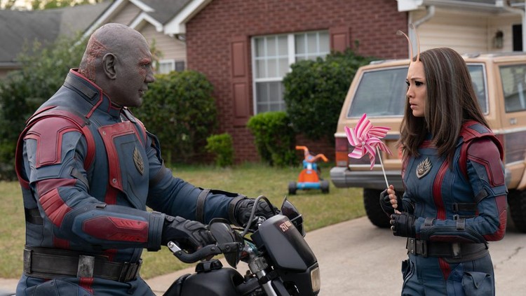 THE GUARDIANS OF THE GALAXY VOL. 3 (L-R): Dave Bautista as Drax and Pom Klementieff as Mantis in Marvel Studios' Guardians of the Galaxy Vol. 3. Photo by Jessica Miglio. © 2023 MARVEL.