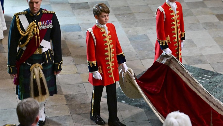 LONDON, ENGLAND - MAY 06: Britain's Prince William, Prince of Wales, Princess Charlotte, Prince Louis and Britain's Catherine, Princess of Wales attend the Coronation of King Charles III and Queen Camilla at Westminster Abbey on May 6, 2023 in London, England. The Coronation of Charles III and his wife, Camilla, as King and Queen of the United Kingdom of Great Britain and Northern Ireland, and the other Commonwealth realms takes place at Westminster Abbey today. Charles acceded to the throne on 8 September 2022, upon the death of his mother, Elizabeth II. (Photo by Yui Mok  - WPA Pool/Getty Images)