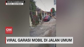 VIDEO: Viral Garasi Mobil di Jalan Umum