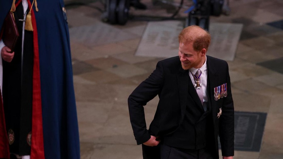 Britain's Prince Harry, Duke of Sussex, walks outside Westminster Abbey ahead of Britain's King Charles' coronation ceremony, in London, Britain May 6, 2023. REUTERS/Dylan Martinez     TPX IMAGES OF THE DAY