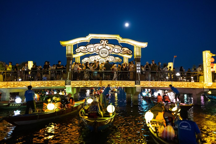 Tourists ride boats along the Thu Bon River in the old town of Hoi An, Qung Nam Province, Vietnam, on Thursday, May 4, 2023. Vietnam's retail sales grew 11.5% in April, according to figures released by the General Statistics Office of Vietnam. Photographer: SeongJoon Cho/Bloomberg via Getty Images