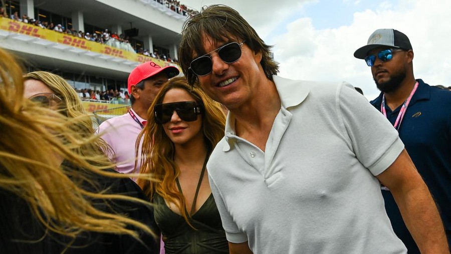 US actor Tom Cruise (R) and Colombian singer Shakira (L) attend the 2023 Miami Formula One Grand Prix at the Miami International Autodrome in Miami Gardens, Florida, on May 7, 2023. (Photo by CHANDAN KHANNA / AFP) (Photo by CHANDAN KHANNA/AFP via Getty Images)