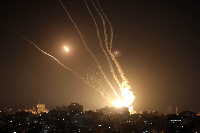 Rockets are fired from Gaza City toward Israel, on May 10, 2023. Israel's army and Gaza militants traded heavy cross-border fire on May 10, with 22 Palestinians killed over two days amid the worst escalation of violence to hit the coastal territory in months. (Photo by MOHAMMED ABED / AFP) (Photo by MOHAMMED ABED/AFP via Getty Images)