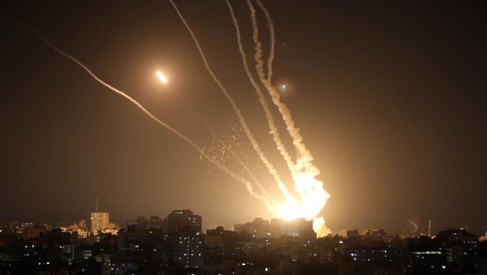 Rockets are fired from Gaza City toward Israel, on May 10, 2023. Israel's army and Gaza militants traded heavy cross-border fire on May 10, with 22 Palestinians killed over two days amid the worst escalation of violence to hit the coastal territory in months. (Photo by MOHAMMED ABED / AFP) (Photo by MOHAMMED ABED/AFP via Getty Images)