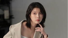 IU Gandeng V BTS dan Sutradara Concrete Utopia Garap Love Wins