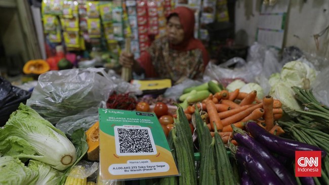 Pengamat menyebut pengenaan biaya layanan QRIS sebesar 0,3 persen mulai 1 Juli lalu berpotensi membuat pengguna sistem pembayaran itu kabur.