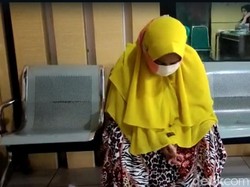 Momen Masriah Penyiram Kencing-Tinja Terbisu dan Menunduk Menanti Sanksi
