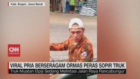 VIDEO: Viral Pria Berseragam Ormas Peras Sopir Truk