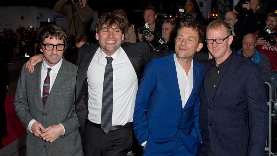 Graham Coxon, Alex James, Damon Albarn and Dave Rowntree of Blur arriving at the GQ Men of the Year Awards 2015 at the Royal Opera House in London (Photo by Zak Hussein/Corbis via Getty Images)