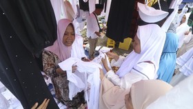 FOTO: Raup Cuan dari Penjualan Perlengkapan Ibadah Haji