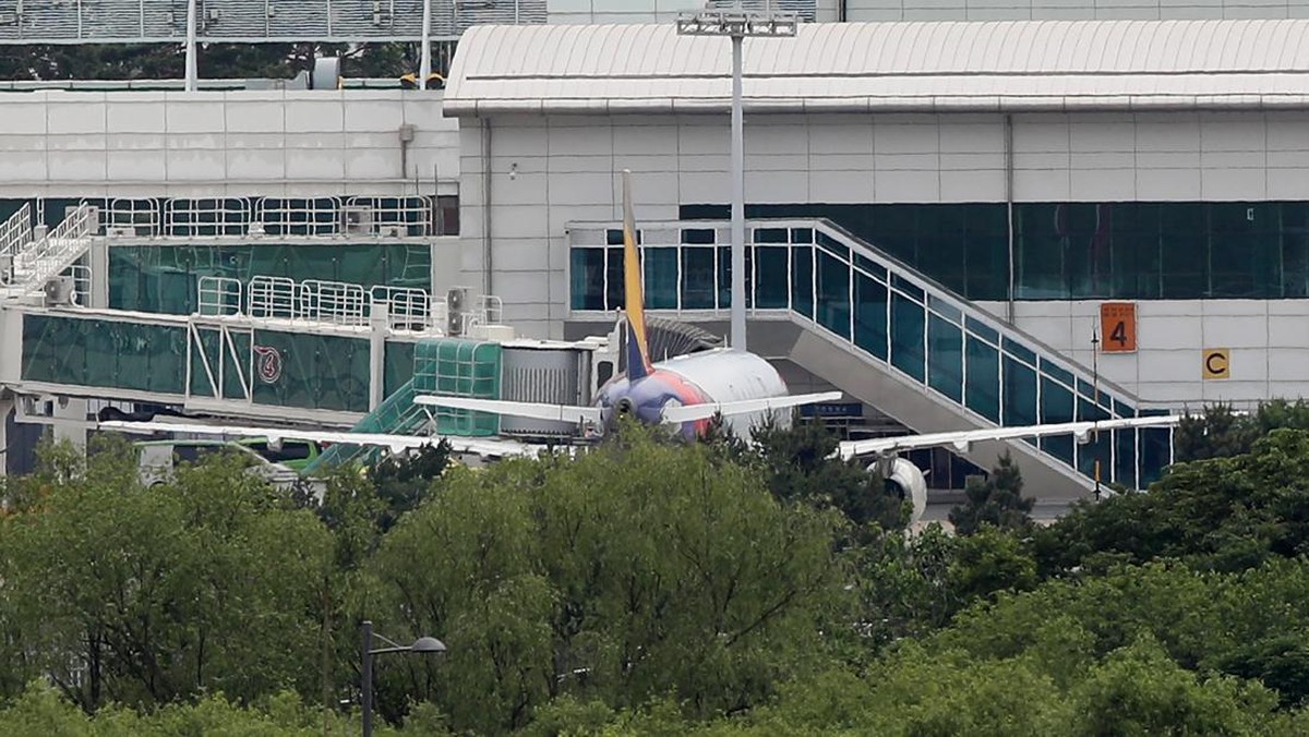 FOTO: Penampakan Pintu Pesawat Asiana Airlines yang Dibuka Paksa